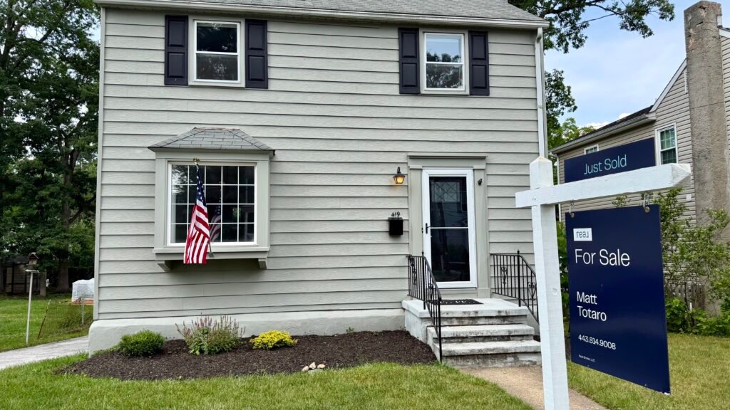 sell a house in Catonsville, MD showing a for sale sign on Locust Drive